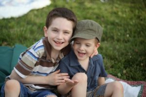 two little boys smiling