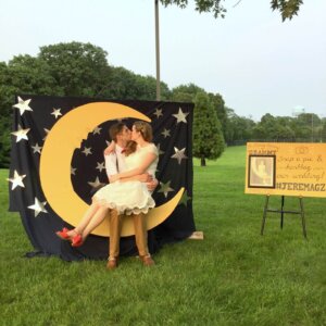 bride and groom at photo booth